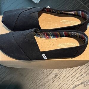 Toms Black Canvas Slip-Ons